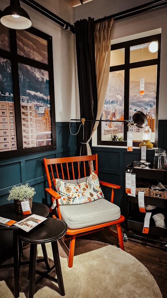 Stylish living room setup with chair, table, and mountain view.