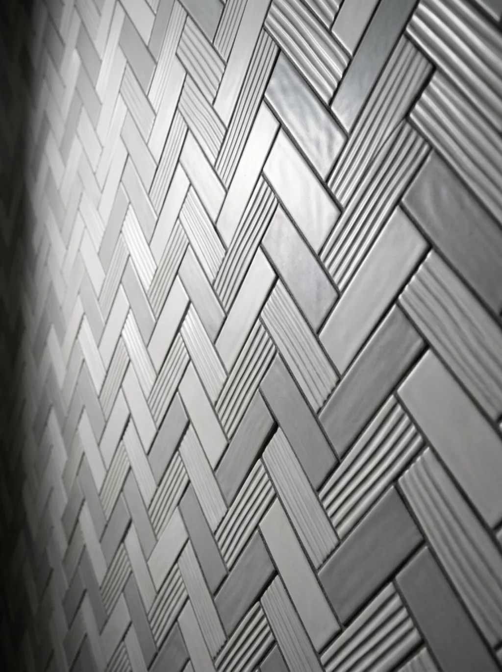 Herringbone Patterns Turn Straight Tiles Into a Visual Heartbeat